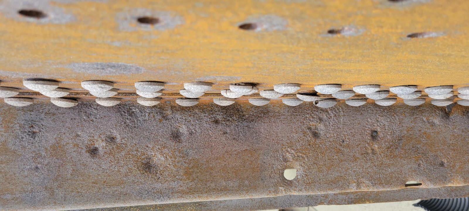 Seamless polyurea membrane over a leaking camper roof deck