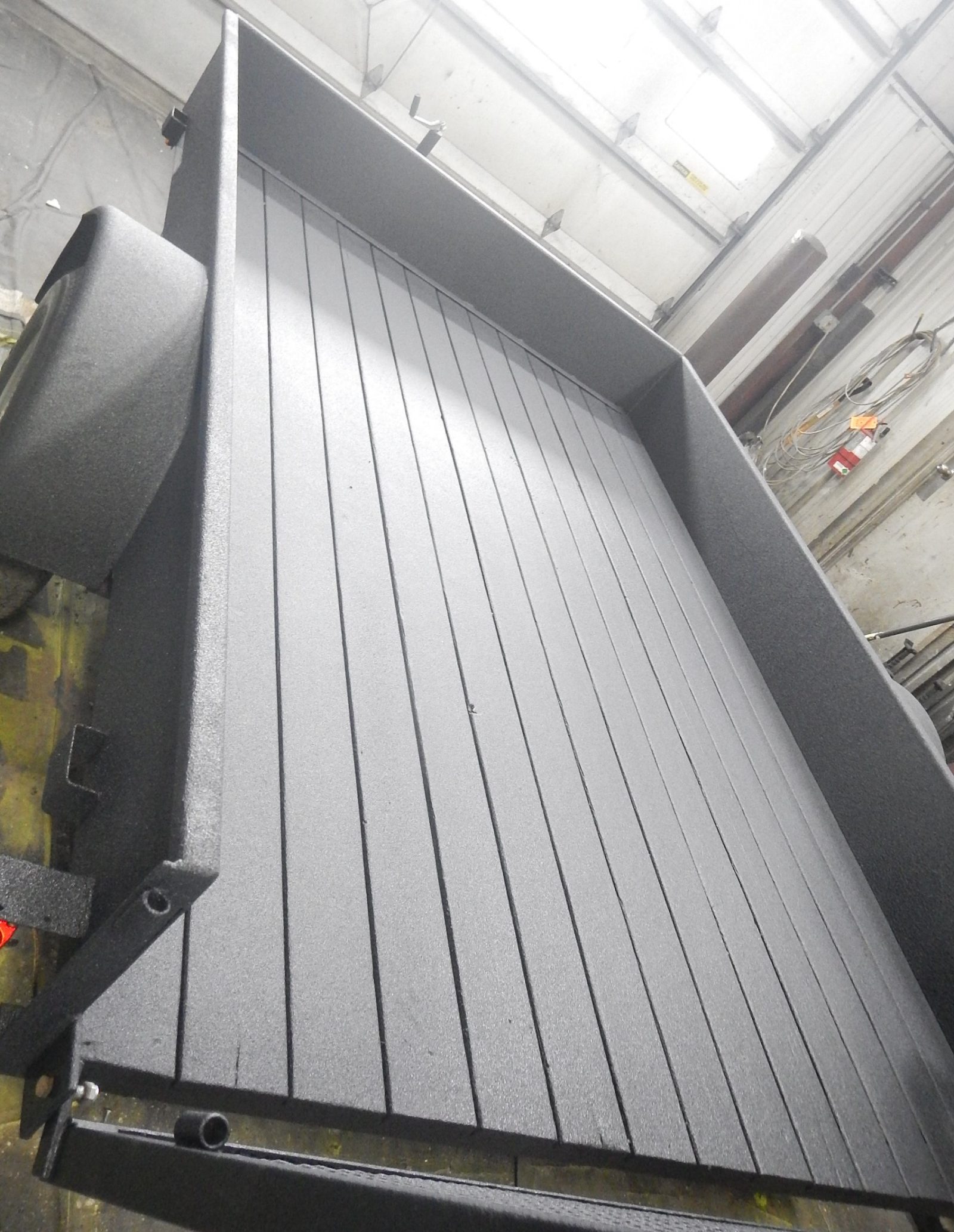 Camper roof penetration sealed with self-flashing polyurea